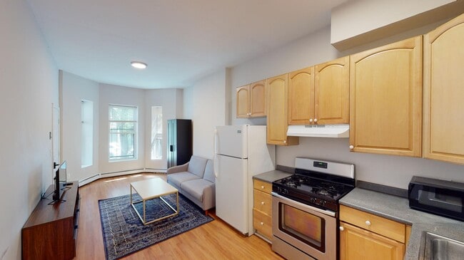 65 Hammond St, Unit 1 in Boston, MA - Foto de edificio - Building Photo