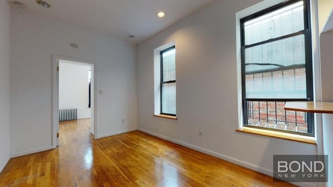 property at 68 E 1st St
