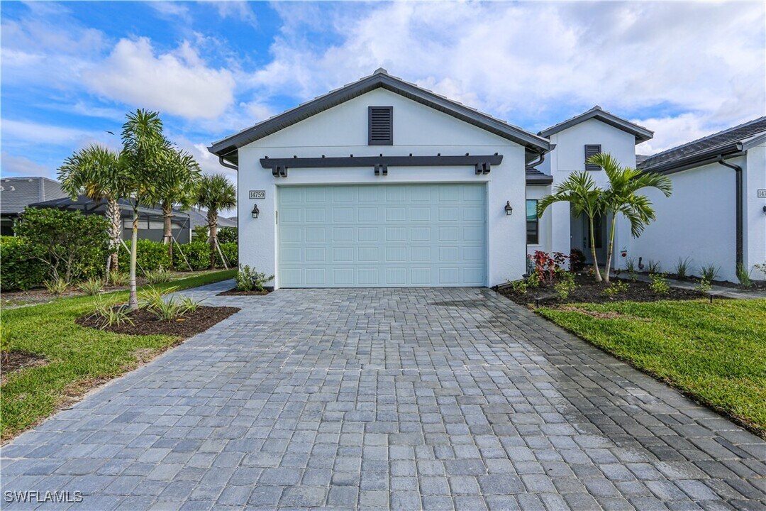 14759 Kingfisher Lp in Naples, FL - Building Photo