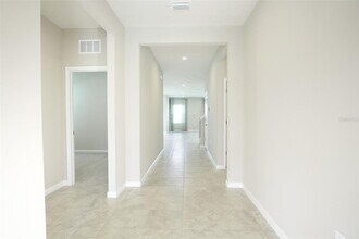 1892 Basenji Dr in Lake Alfred, FL - Building Photo - Building Photo