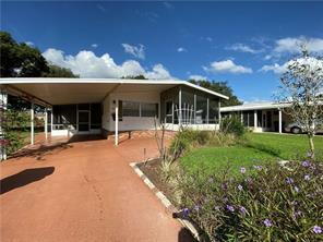 11 Woodland Cir in Haines City, FL - Building Photo