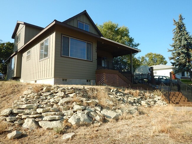 property at 704 NE Loper Ave