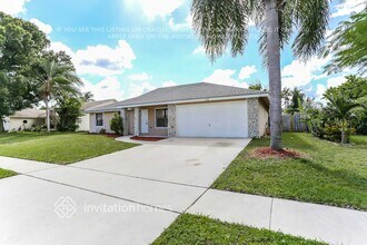 112 La Mancha Ave in Royal Palm Beach, FL - Building Photo - Building Photo