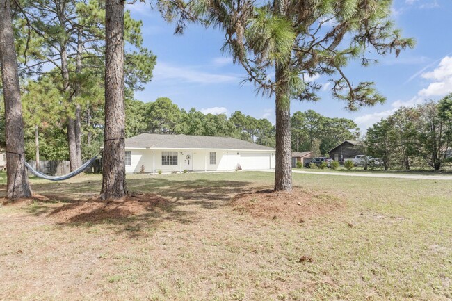 9270 Quail Roost Dr in Navarre, FL - Building Photo - Building Photo