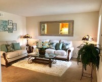 Living Room - Heron Lakes Country Club Apartment Homes in Mobile, Alabama