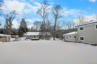 2060 Dunwoodie St, Unit 4253-104 in Ortonville, MI - Building Photo - Building Photo