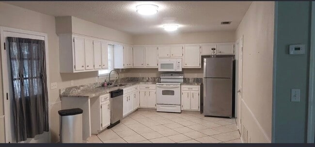 property at 115 Sandlewood Cir N