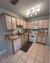 1655 The Greens Way in Jacksonville Beach, FL - Foto de edificio - Building Photo