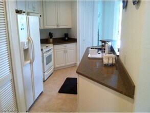 1370 Sweetwater Cove in Naples, FL - Building Photo - Building Photo