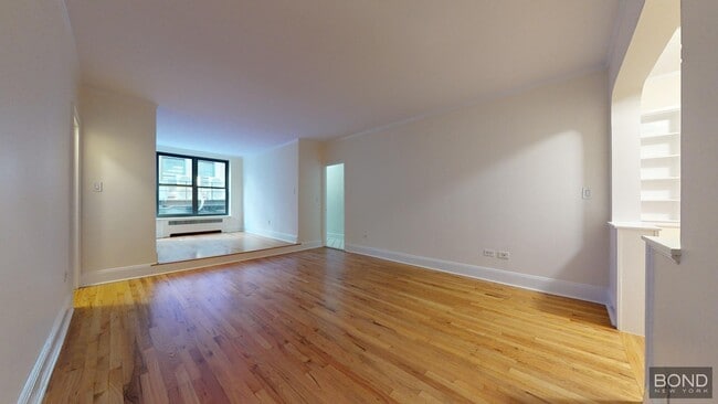 property at 124 E 24th St