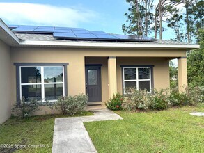 239 Brickell St SE in Palm Bay, FL - Foto de edificio - Building Photo