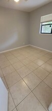 4090 N Pine Island Rd, Unit 303 in Sunrise, FL - Foto de edificio - Building Photo