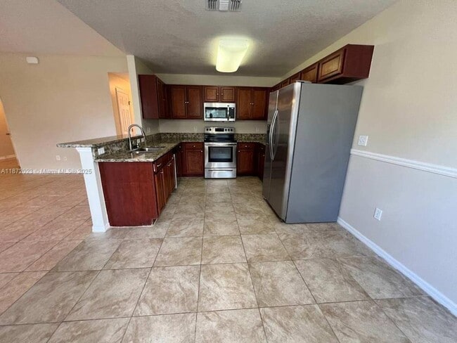 property at 957 SW Harvard Rd