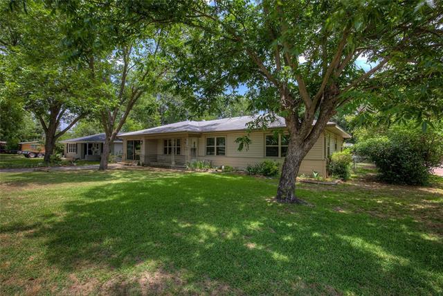 2506 Washington St in Commerce, TX - Building Photo