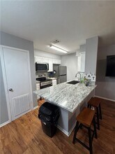 1305 W Villa Maria Rd, Unit E104 in Bryan, TX - Building Photo - Building Photo