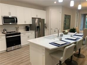 208 Indies Dr E-Unit -202 in Naples, FL - Building Photo - Building Photo