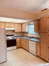 1008C NE Whispering Winds Ct in Lee's Summit, MO - Foto de edificio - Building Photo