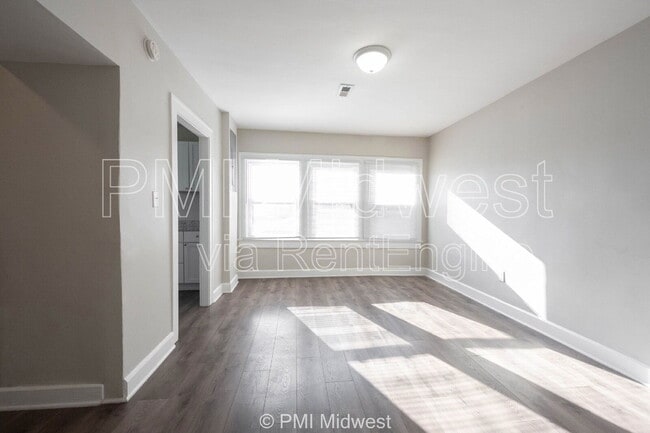 property at 5045 E 10th St