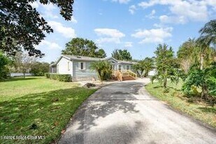 4159 Hidden Lakes Dr in Mims, FL - Building Photo