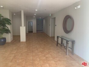 10790 Rose Ave-Unit -107 in Los Angeles, CA - Building Photo - Building Photo