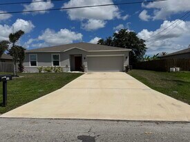 3725 SW Kasin St in Port St. Lucie, FL - Building Photo