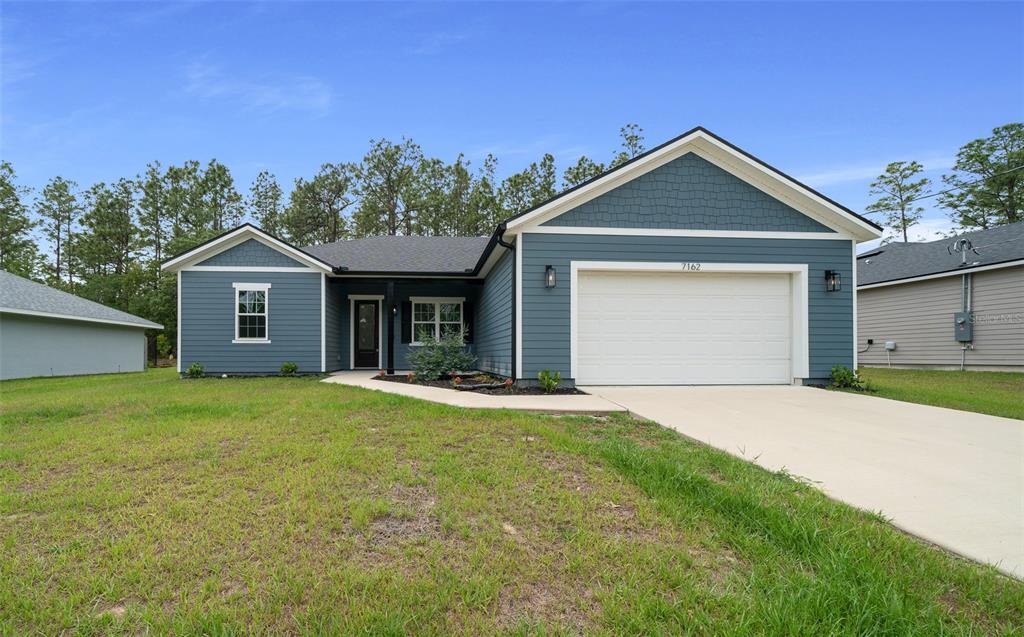 7162 N Cricket Dr in Citrus Springs, FL - Building Photo