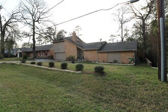 25107 Spring Creek Dr in Spring, TX - Building Photo - Building Photo