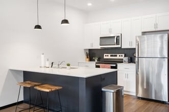 Urbane 210 in Davenport, IA - Building Photo - Building Photo