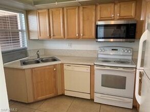 190 Pebble Beach Blvd-Unit -504 in Naples, FL - Building Photo - Building Photo