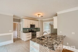 1140 Johns Landing Ct in Lawrenceville, GA - Foto de edificio - Building Photo