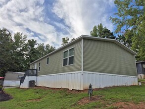 6017 Whispering Pines in Buford, GA - Building Photo - Building Photo