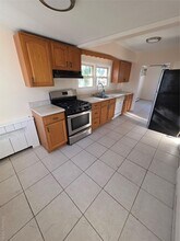 1075 Harrison St in Uniondale, NY - Building Photo - Building Photo