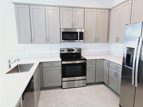 7645 Stone Crk Trl in Kissimmee, FL - Building Photo - Building Photo
