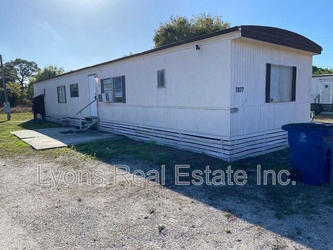 property at 7877 Suncoast Dr
