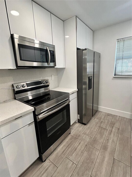 1220 NW 122nd Ter in Pembroke Pines, FL - Building Photo