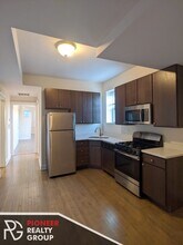 2816 N Troy St, Unit 2F in Chicago, IL - Foto de edificio - Building Photo