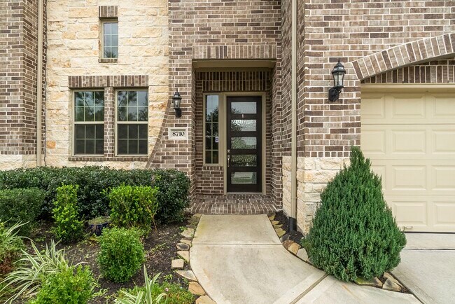 8710 Burdekin Rd in Magnolia, TX - Foto de edificio - Building Photo