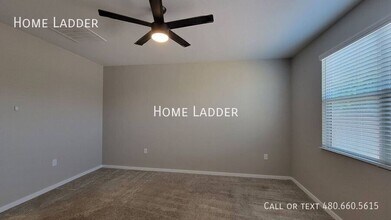 14096 W Surrey Dr in Surprise, AZ - Building Photo - Building Photo