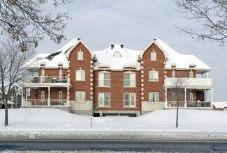 367-381 Barcelone in Dollard-des-Ormeaux, QC - Building Photo - Building Photo