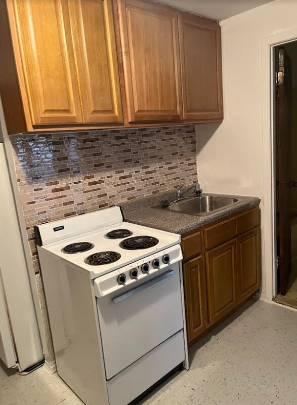 91-04-91-75 75th St, Unit 1 in Queens, NY - Foto de edificio - Building Photo