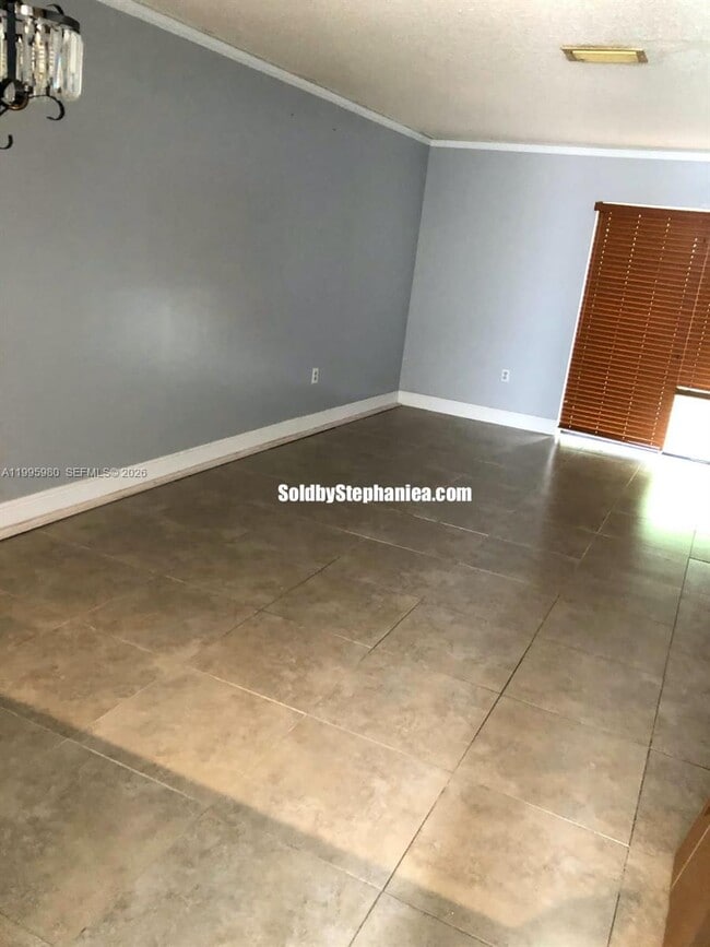 property at 6858 NW 173rd Dr