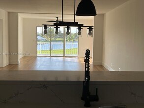 250 John F Kennedy Dr in Atlantis, FL - Building Photo - Building Photo