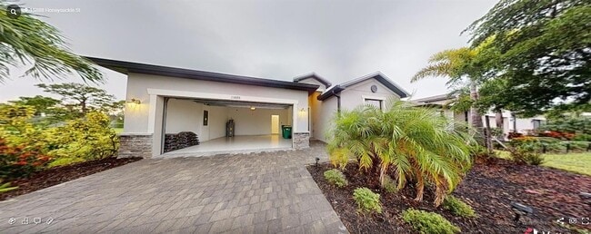 15888 Honeysuckle St in Port Charlotte, FL - Building Photo - Building Photo