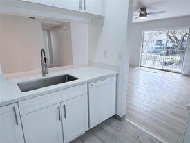 117 Gardens Dr, Unit 201 in Pompano Beach, FL - Building Photo