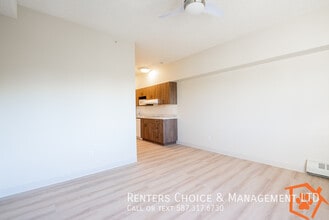 SENIOR LIVING IN THE EDWARDS ,First Floor Bachelor Suite in Lethbridge, AB - Building Photo - Building Photo