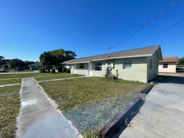 1205 Ave K in Fort Pierce, FL - Foto de edificio - Building Photo