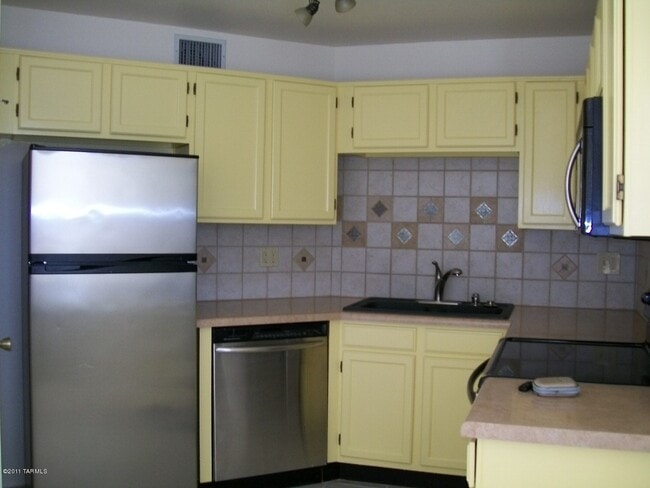 property at 6655 N Canyon Crest Dr