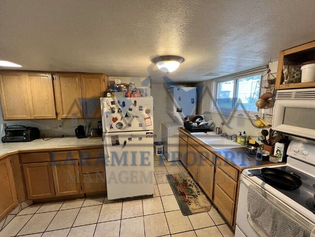 658 1/2 N 9th St in Laramie, WY - Foto de edificio - Building Photo