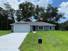9065 N Akola Way in Citrus Springs, FL - Building Photo