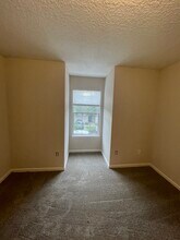 5260 Collins Rd, Unit 402 in Jacksonville, FL - Foto de edificio - Building Photo